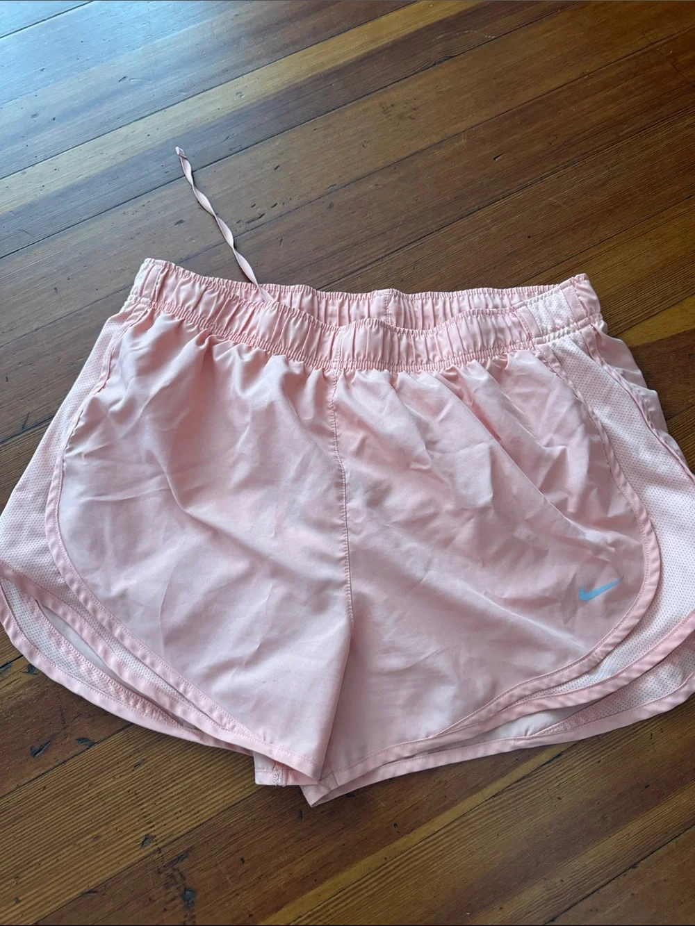 Nike Women's Pale Pink Running Shorts with Light Blue Swoosh